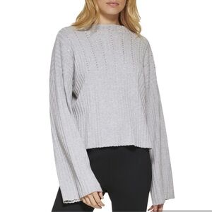 DKNY Women's Sportswear Sweater is a studded ribbed bell long sleeve swe…